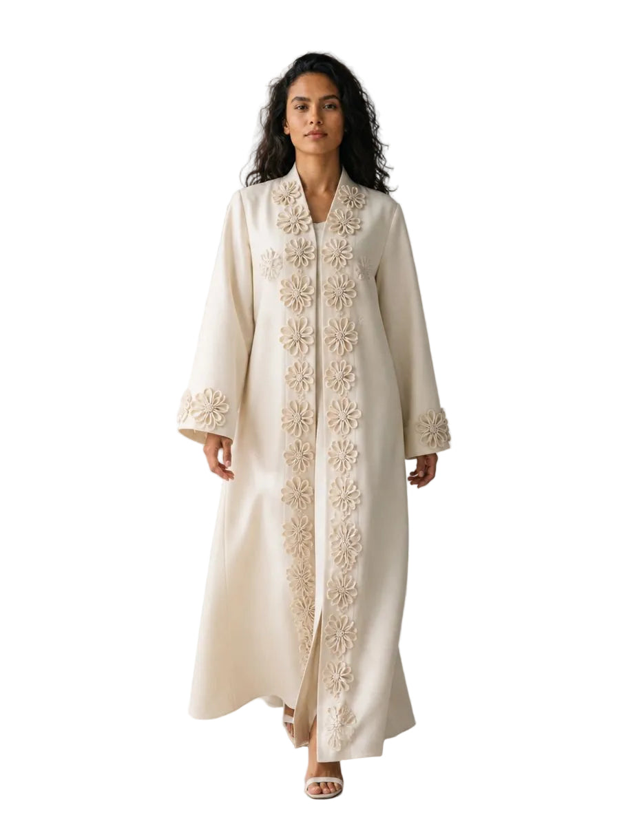 Ivory abaya with flower appliqué trim down the front, worn with a matching sheila