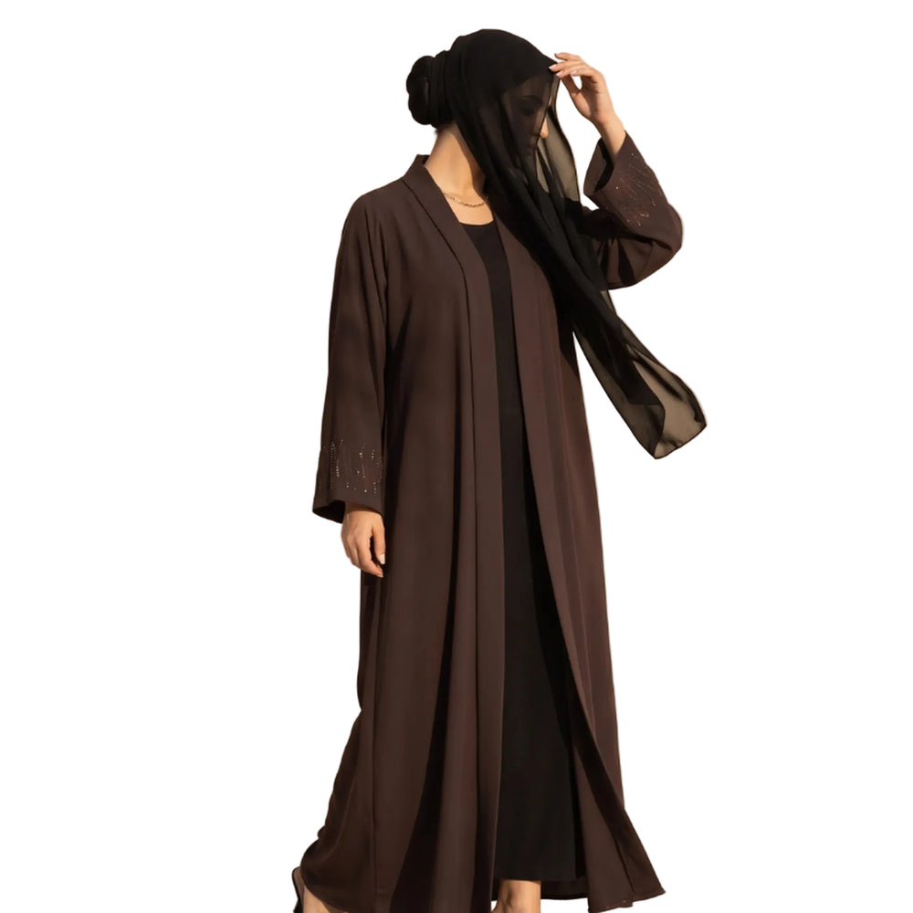 Chocolate brown open-front abaya with a scatter of diamante on the cuffs, worn standing