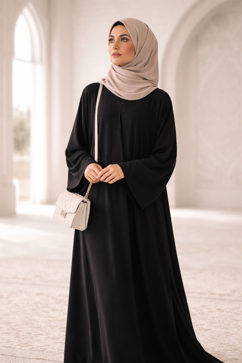 Modest lightweight abaya for Umrah designed for comfort, ease of movement, and full coverage during pilgrimage