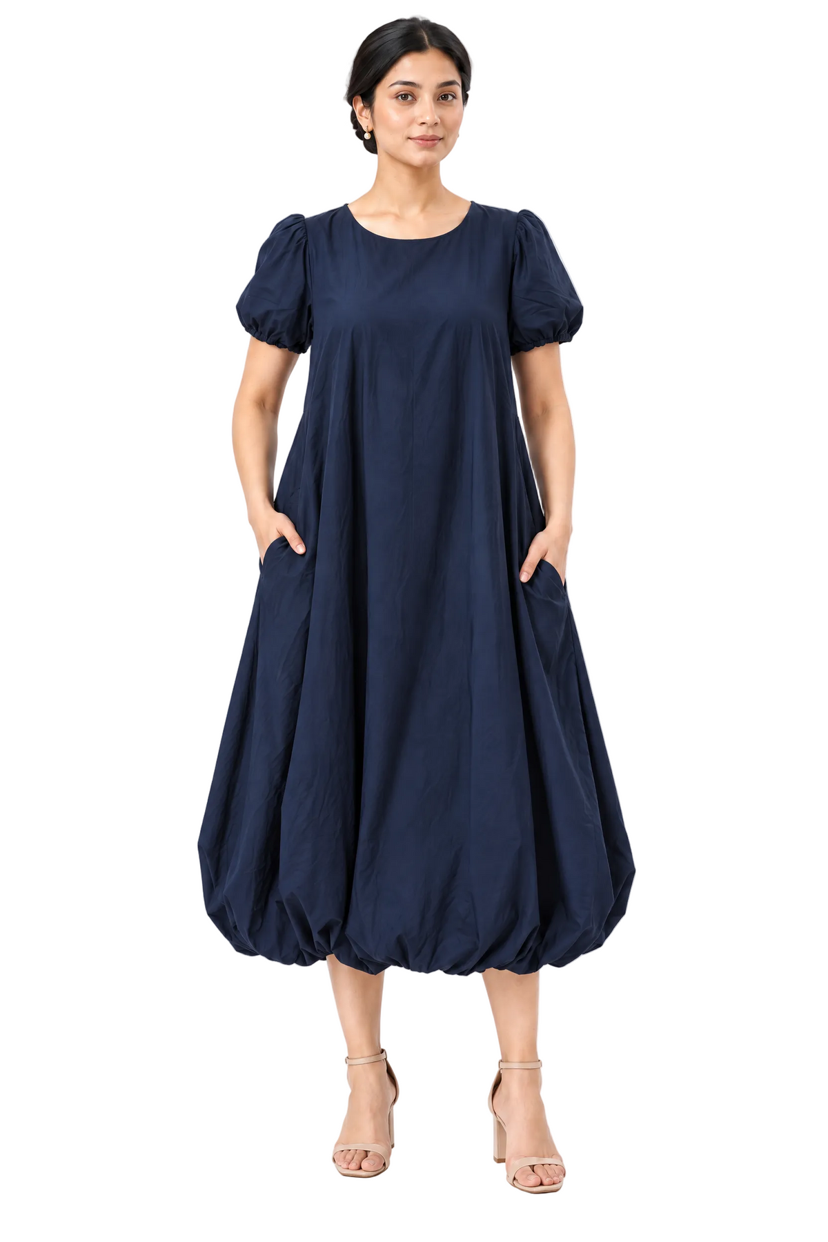 Full-length front view of The Lamorah navy puff-sleeve balloon-hem dress worn without its removable sash.