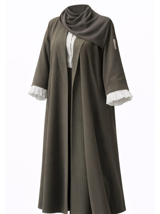 Olive abaya with a pleated front panel and white pleated cuffs, cut to measure by The Lamorah Dubai