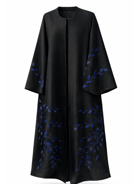 Black abaya with cobalt blue leaf and vine embroidery on the sleeves and lower body, cut to measure by The Lamorah Dubai