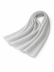 White chiffon shella folded on a white background, from The Lamorah Dubai