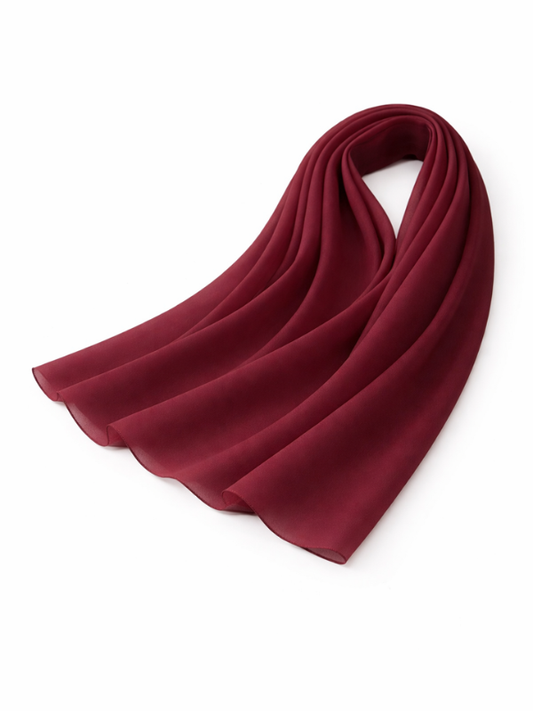 Burgundy chiffon shella folded on a white background, from The Lamorah Dubai