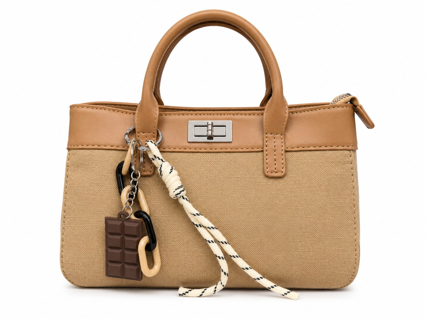 Sand woven canvas mini tote with camel leather trim, silver twist lock and a chocolate bar charm, from The Lamorah Dubai
