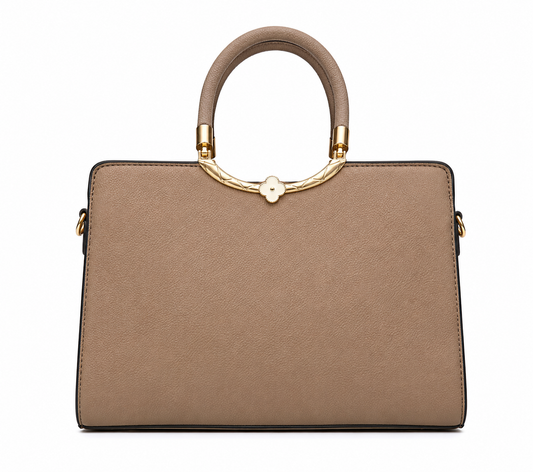 Taupe suede-look frame bag with a gold arc handle mount and a cream four-petal clover medallion, from The Lamorah Dubai