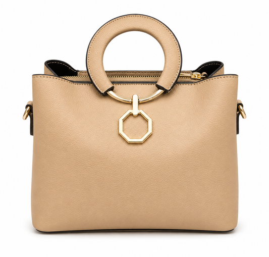 Sand pebbled leather tote with a round padded ring handle and a hanging gold octagon ring, from The Lamorah Dubai