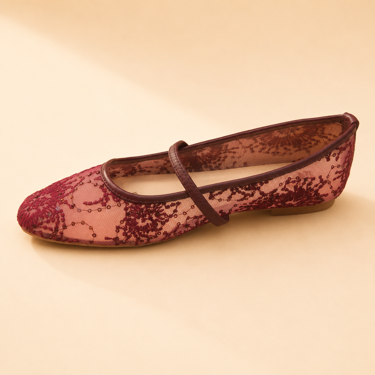 Burgundy lace Mary Jane flat with a deep wine strap and bound edge, from The Lamorah Dubai